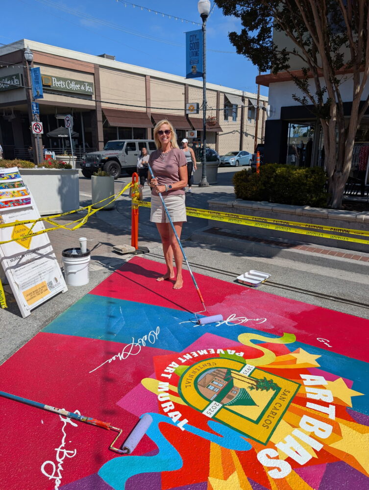 Deb Shea completing the Laurel Street mural in San Carlos, California.